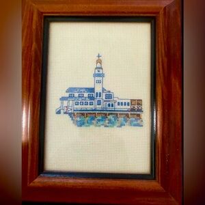 Lighthouse Cross Stitch framed under glass